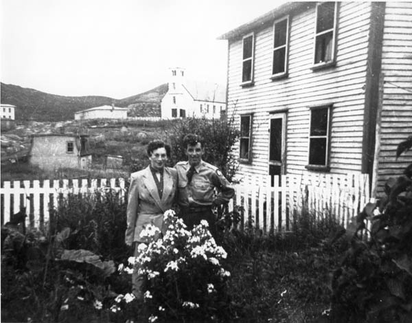 074: Mary Dunphy and her future husband Herb Lamb, in Mrs. Jule McCarthy's garden.  (1950) [courtesy of Mary (Dunphy) Lamb]  - Mary daughter of Thomas Dunphy &amp;amp; Anne Carroll